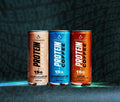 Three cans of protein ice coffee against a backdrop highlighting the birthday sale