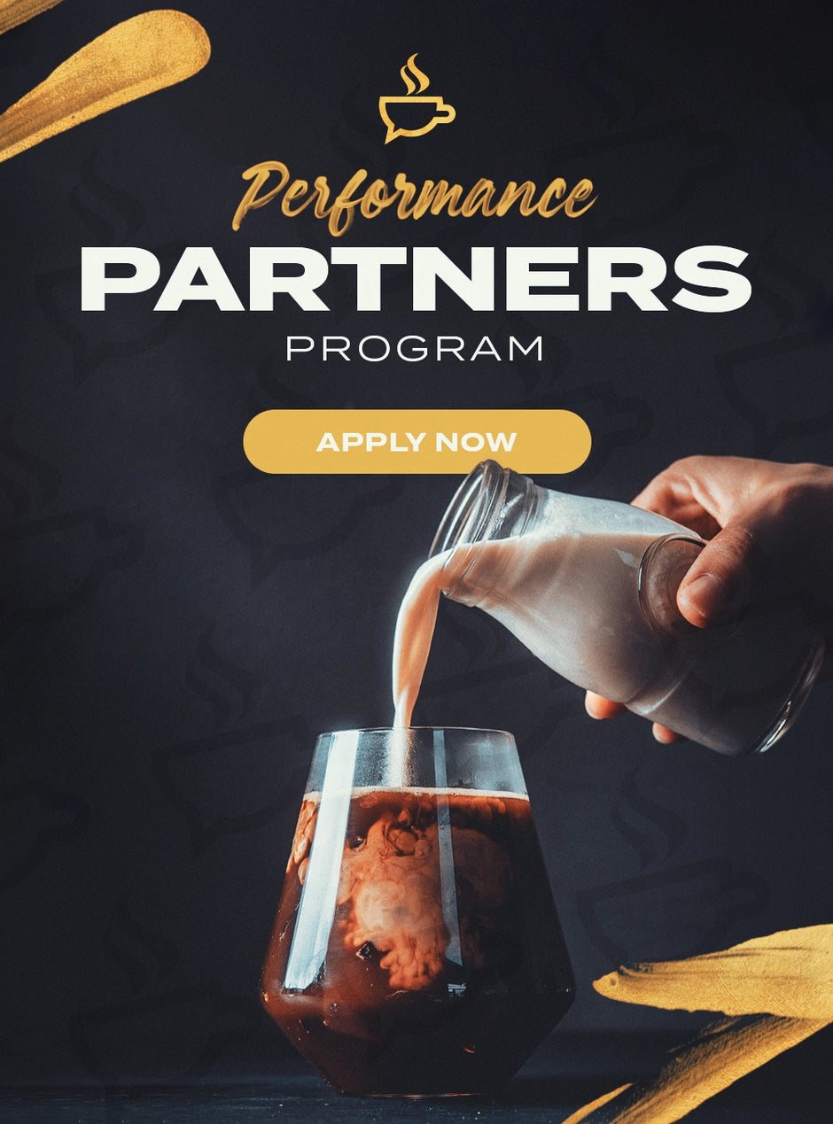 Promotional graphic for a 'Performance Partners Program' with a hand pouring milk into a glass of iced coffee.
